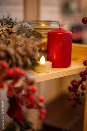 christmas still life with candle and decorations