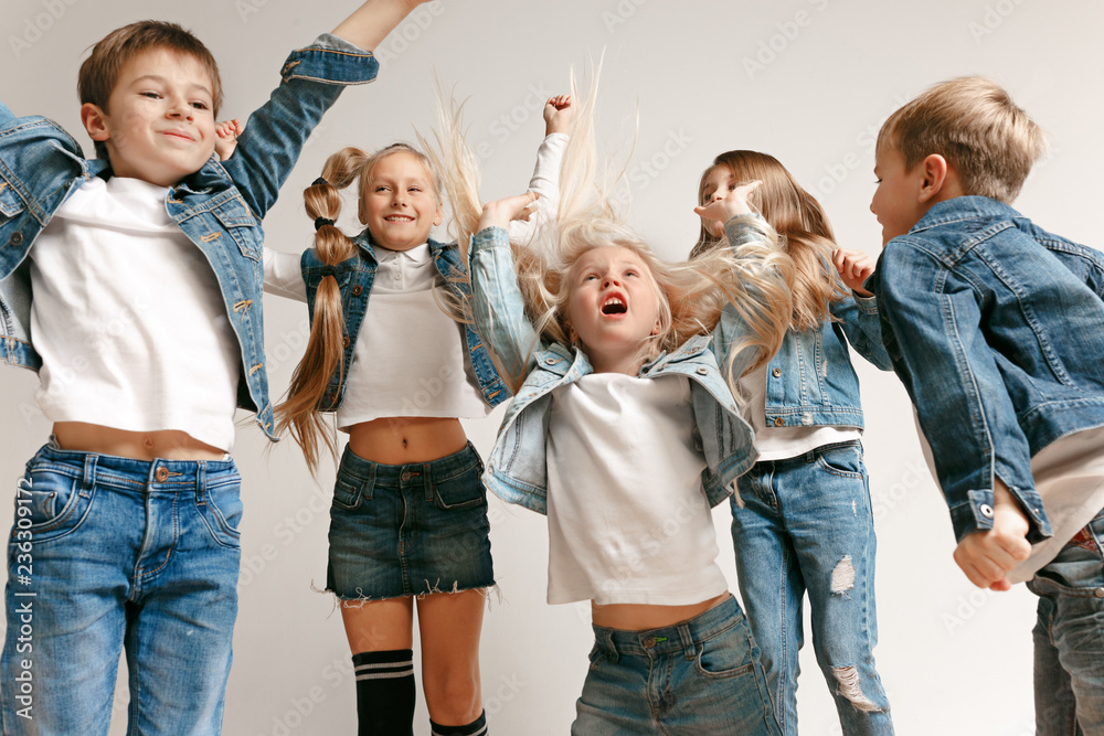 Little Kids Wearing Different Fashion Clothes - Stock