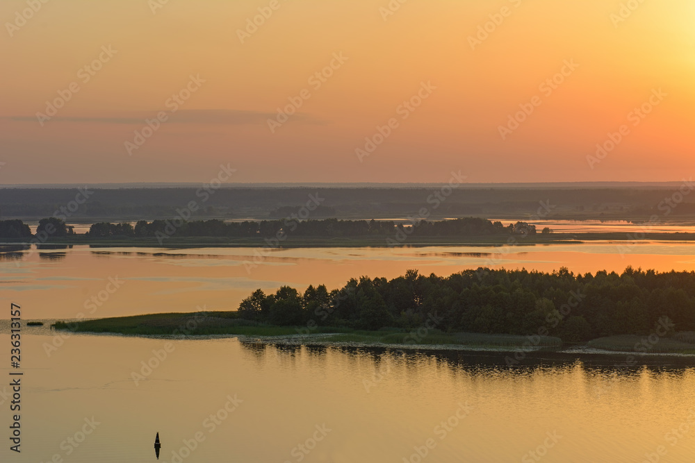 Fototapeta premium Sunrise over the river in the summer