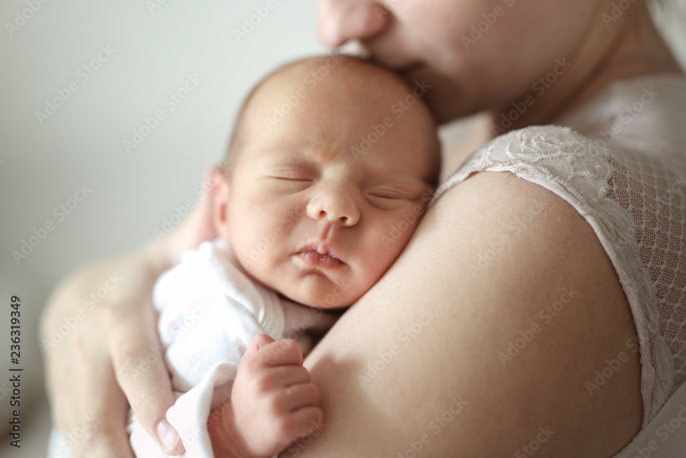 Mom and newborn baby. Light tone and soft toning - obrazy, fototapety, plakaty 