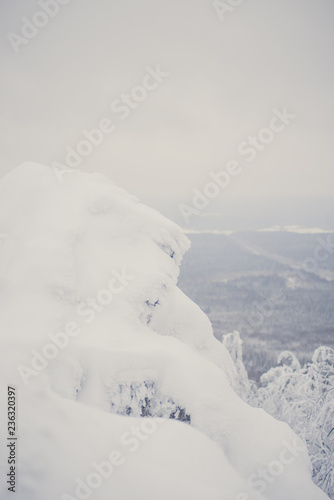 Winter Landscape with Stone Rock Covered with Snow - South Ural mountains, Russia © malykalexa777