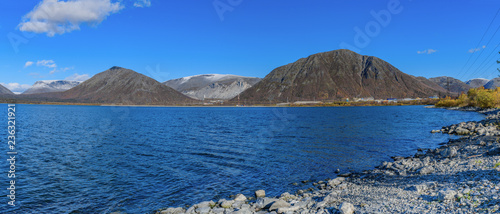 Autumn panoramic landscape with a mountain lake. Big Voodyavr, Kirovsk, Kola peninsula, Murmansk region, Russia. photo