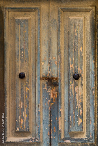 Yellow door with paint in Valletta, Malta