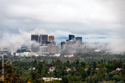 low clouds around high-rise buildings 