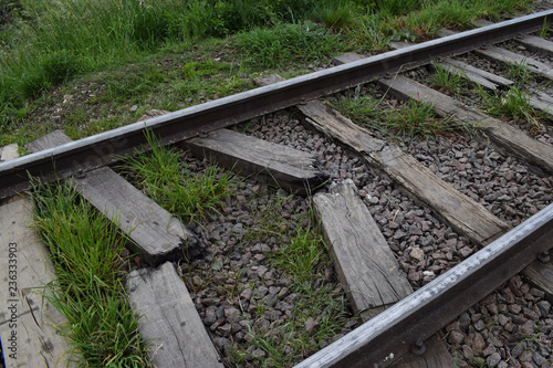 rails and sleepers, on the railway on broken sleepers are rails