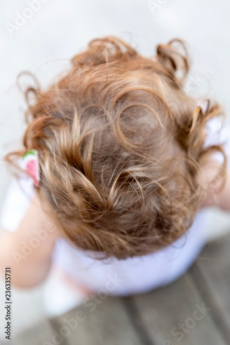 A child's head and hair detail shot from above