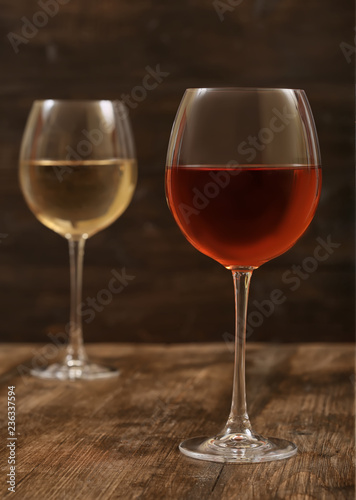 Wine in a glass on a wooden background
