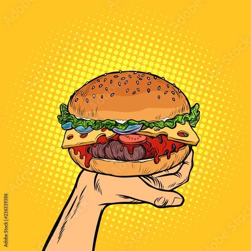 Burger on hand. fast food