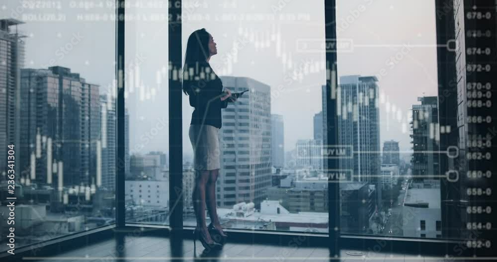 Conceptual shot of businesswoman with infographics digital composite