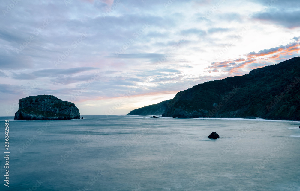 dawning in gaztelugatxe on an autumn day. Beautiful colors, perfect for a postcard. Basque Country, Spain dawning in gaztelugatxe on an autumn day. Beautiful colors, perfect for a postcard. Basque Country, Spain