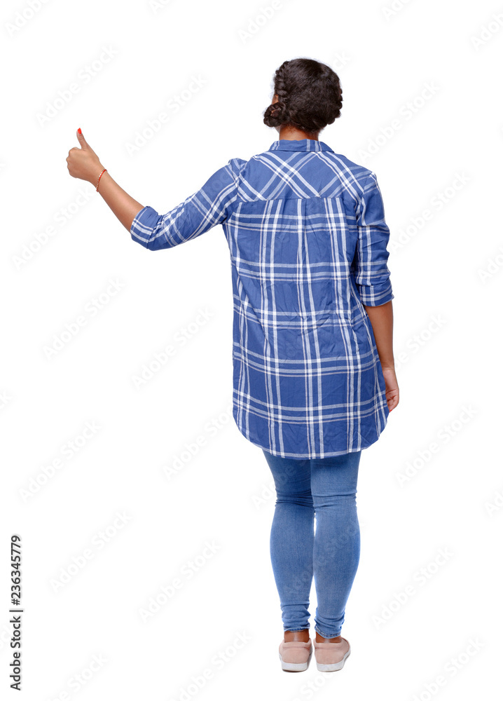 Back view of shocked black woman in blue jeans. Back view of shocked black woman in blue jeans.