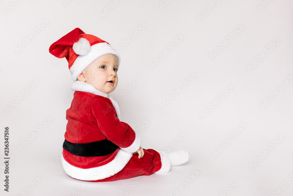 Happy baby girl celebrating Christmas isolated on white background Happy baby girl celebrating Christmas isolated on white background