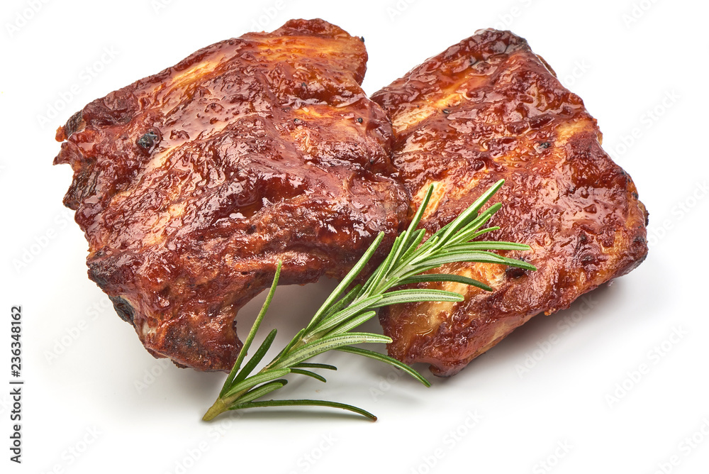 Grilled Ribs with Barbecue Sauce with herbs, isolated on a white background. Close-up Grilled Ribs with Barbecue Sauce with herbs, isolated on a white background. Close-up