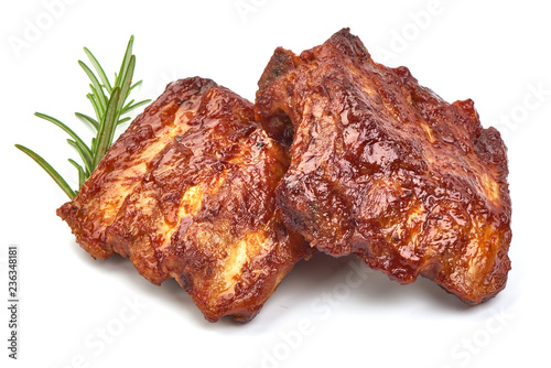 Картината върху платно Barbecued and Marinated Sticky Spare Ribs with herbs, isolated on a white background