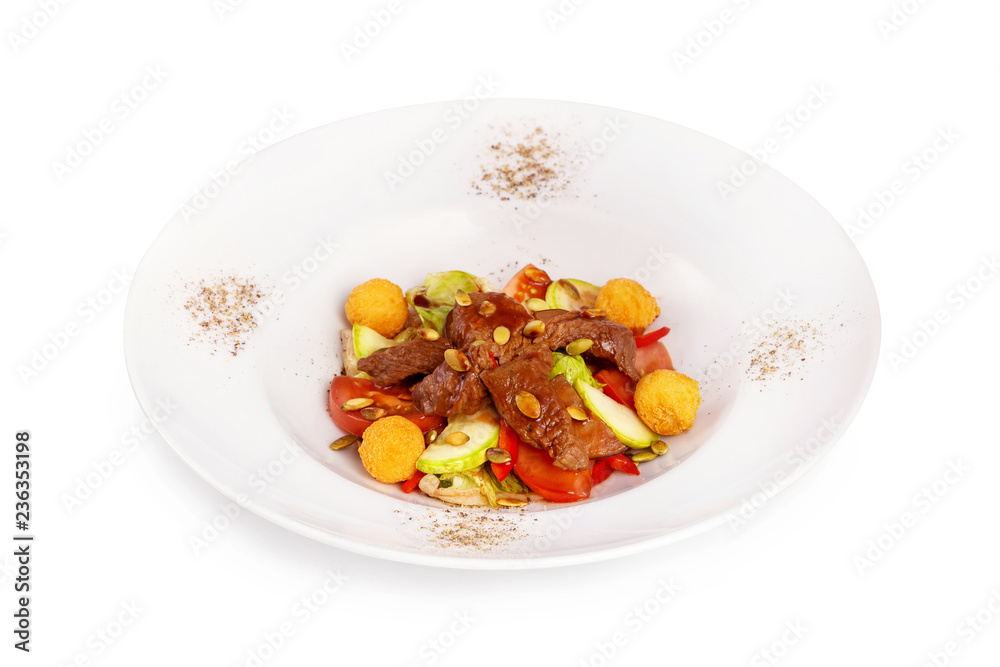 Plate of healthy meat salad with vegetables isolated at white background. Plate of healthy meat salad with vegetables isolated at white background.