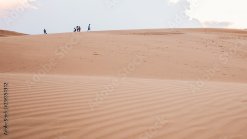 Tourists at the sand dunes in Mue Ne, Vietnam