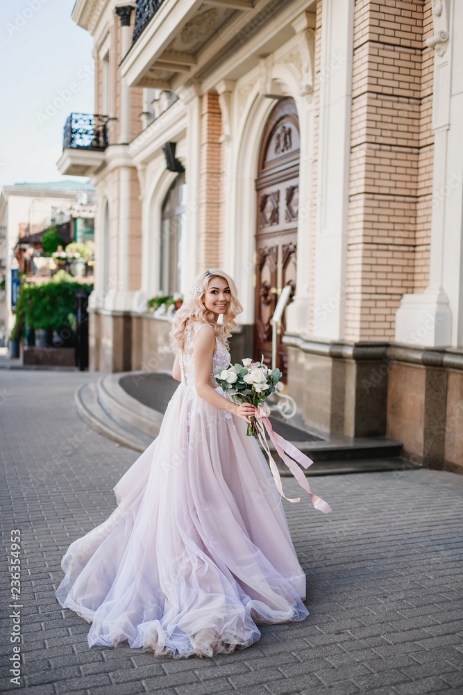 Photo shoot of the newlyweds on the street. Kirov Avenue. Saratov.