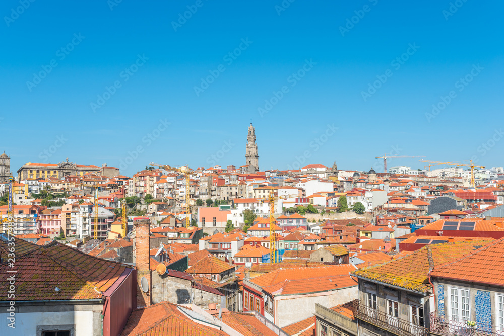 View to the Clérigos tower over the roofs of the historical centre of Porto