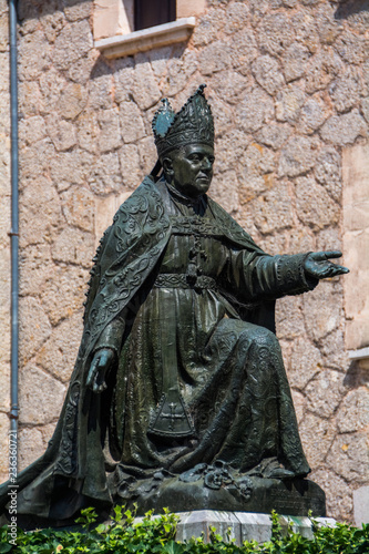 Mallorca, Spain - July 19, 2013:  Monument to Bishop Pere Joan Campins, one of the patrons of the monastery photo