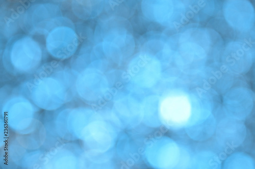 Blue colored abstract background with bokeh
