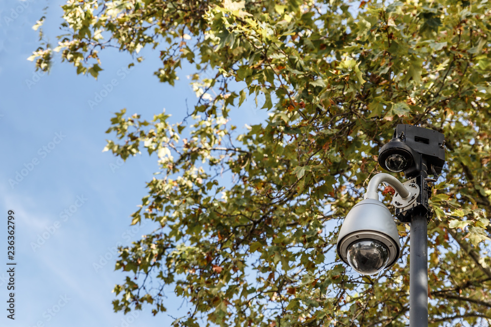 Surveillance and video recording camera placed on a metal pole Surveillance and video recording camera placed on a metal pole