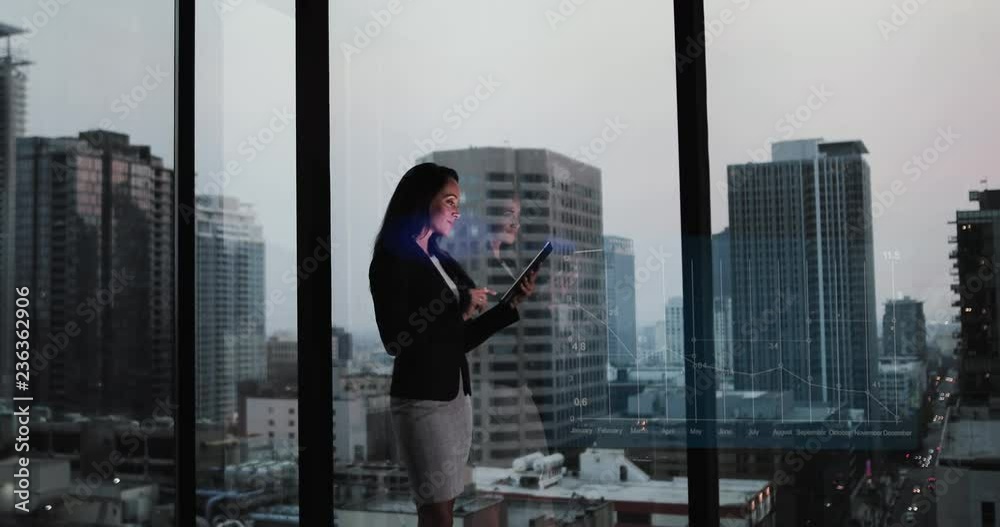 Conceptual shot of businesswoman with infographics digital composite