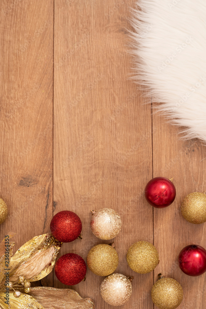 Christmas background. Gold Christmas balls on a wooden background. Winter  holidays concept. Top view with copy space, vertical image Stock Photo |  Adobe Stock