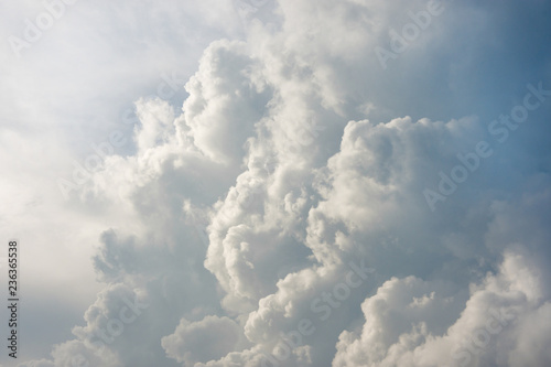 sky with clouds and sunlight closeup. Texture background, copy space