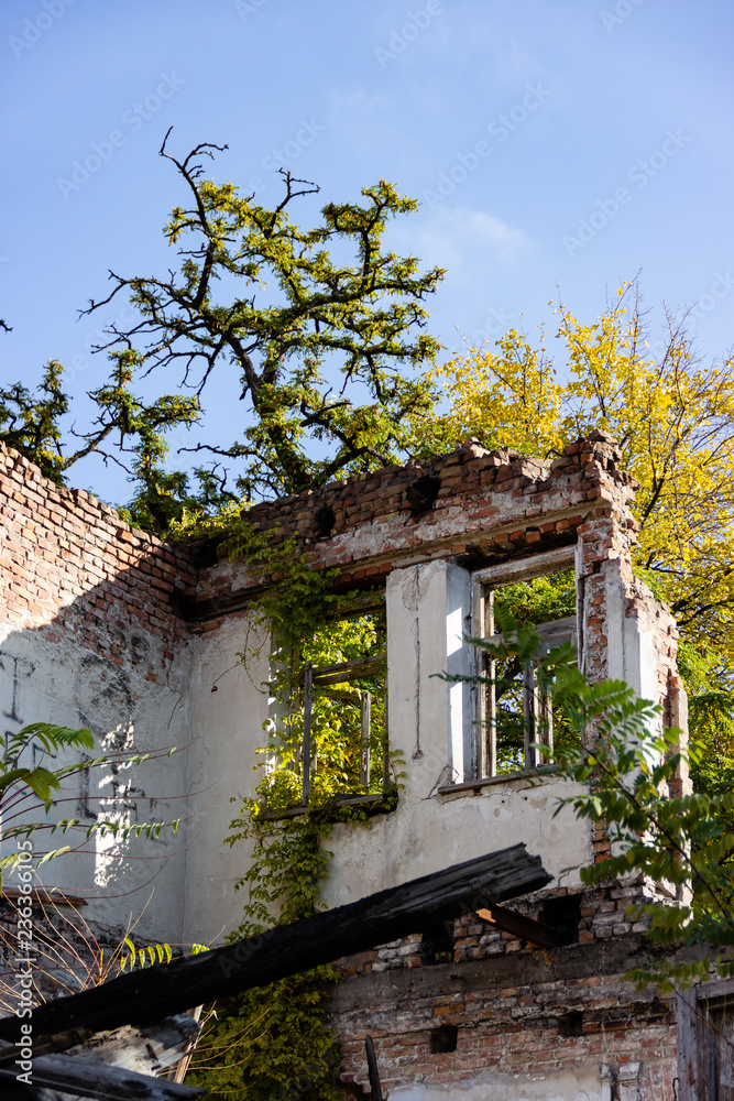 DNIPRO, UKRAINE - NOVEMBER 1, 2018: The ruins of a burnt down ancient house in the city center on Troitska street. DNIPRO, UKRAINE - NOVEMBER 1, 2018: The ruins of a burnt down ancient house in the city center on Troitska street.