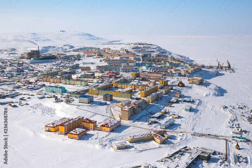 Φωτογραφία Winter landscape with the northern city of Anadyr
