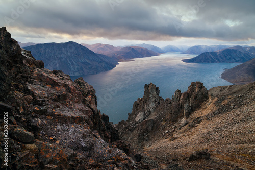 Landscape of Providence Bay and the Bering Sea coast. View from the rocks on the mountain Whirlwind. Provideniya, Chukotka, Russia.