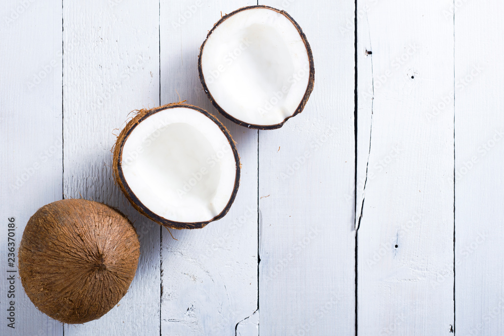 coconuts on white wood table background coconuts on white wood table background