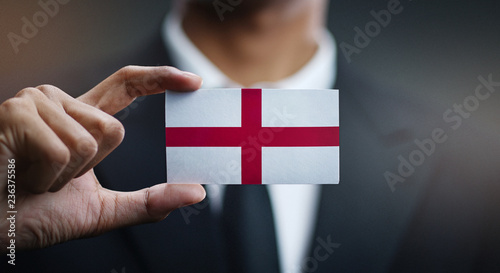 Businessman Holding Card of England Flag