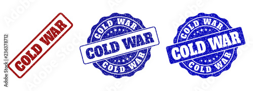 COLD WAR scratched stamp seals in red and blue colors. Vector COLD WAR labels with distress surface. Graphic elements are rounded rectangles, rosettes, circles and text labels.