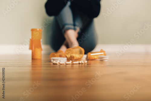 Принти на полотні Caucasian female contemplating take prescription pills
