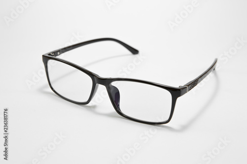 Black eyeglasses on a white background
