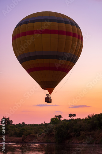 balloon raising in sunrise