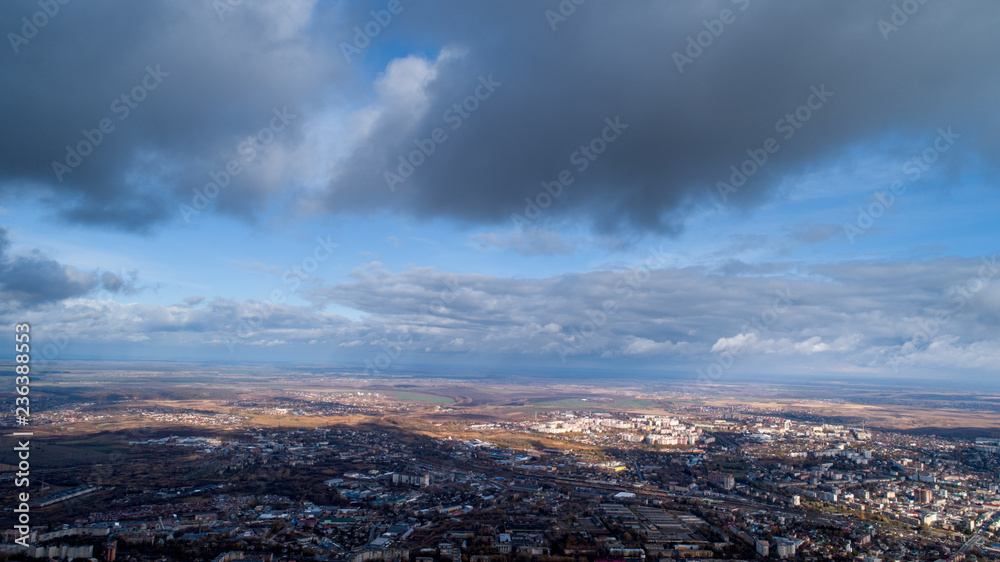 View from the height of the city through the clouds
