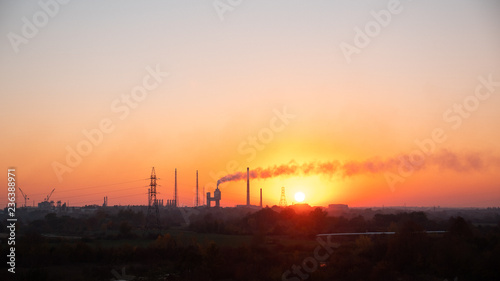 Sunset on the background of the industrial plant, Rivne, Ukraine