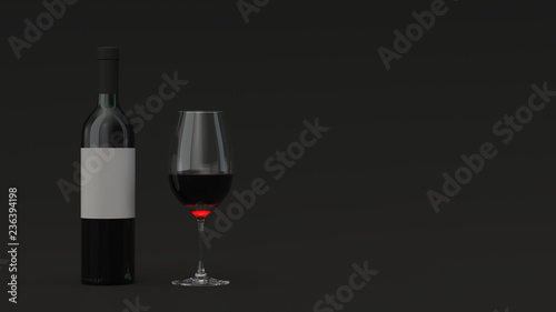 Bottle of red wine and a glass