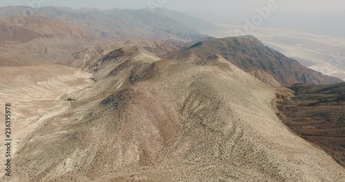 Slow Aerial Drone Shot Revealing the Vast Landscape of Death Valley in Nevada. photo