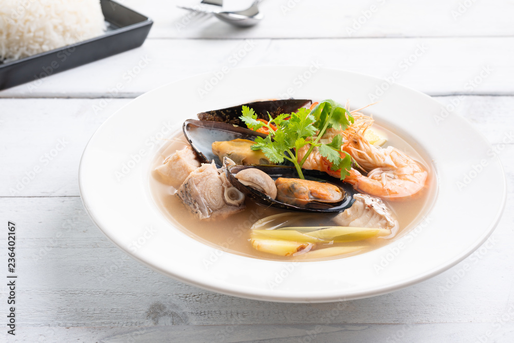 Tom Yum goong nam sai - Seafood Thai soup Tom Yum goong nam sai - Seafood Thai soup