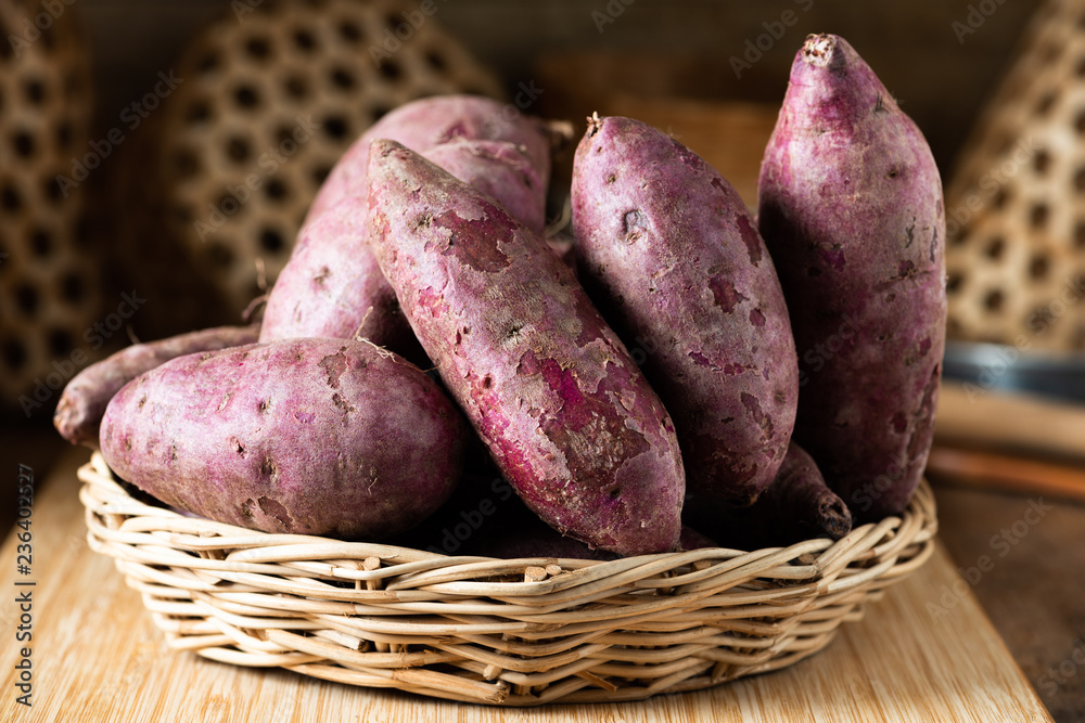 Sweet Potatoes Purple Colored on Table Sweet Potatoes Purple Colored on Table