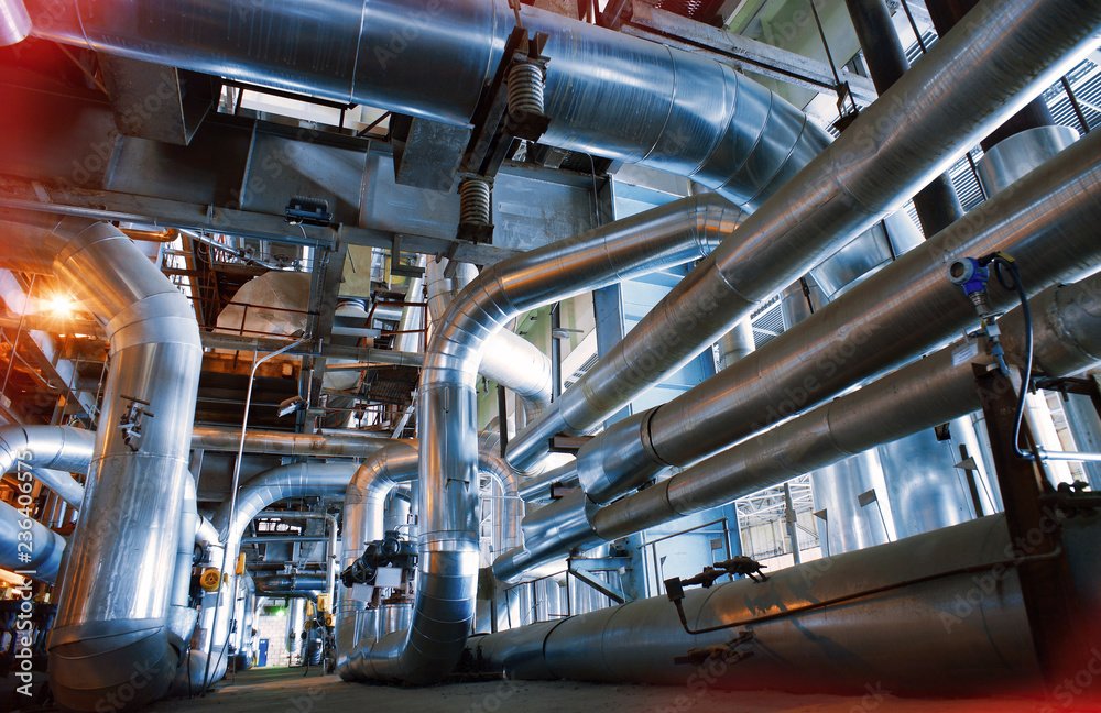 equipment, cables and piping as found inside of a modern industrial power plant equipment, cables and piping as found inside of a modern industrial power plant