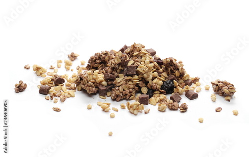 Bild auf Leinwand Crunchy granola, muesli with chocolate and cherry pieces isolated on white backg