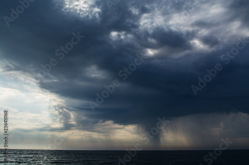 Storm clouds over the sea rain and thunder