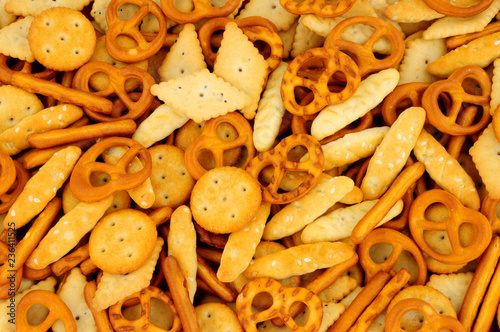 Quadro su tela Savoury pretzel and cracker snack mix background