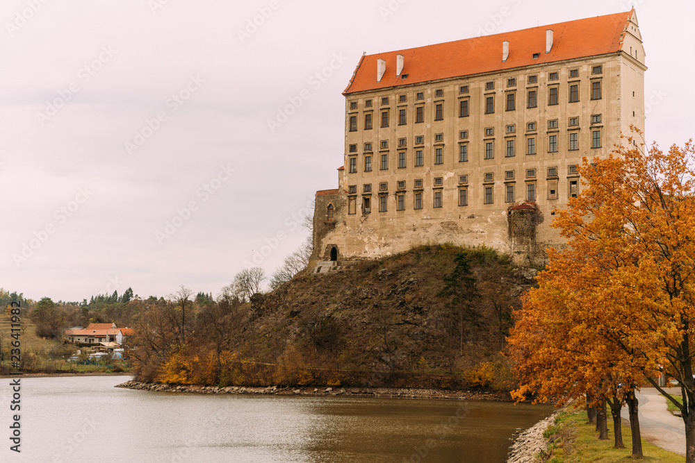 The old Plumlov castle builded in Baroque architecture style in Plumlov town on the pond bank, Moravia, Czech Republic