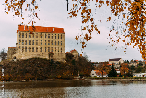 The old Plumlov castle builded in Baroque architecture style in Plumlov town on the pond bank, Moravia, Czech Republic photo