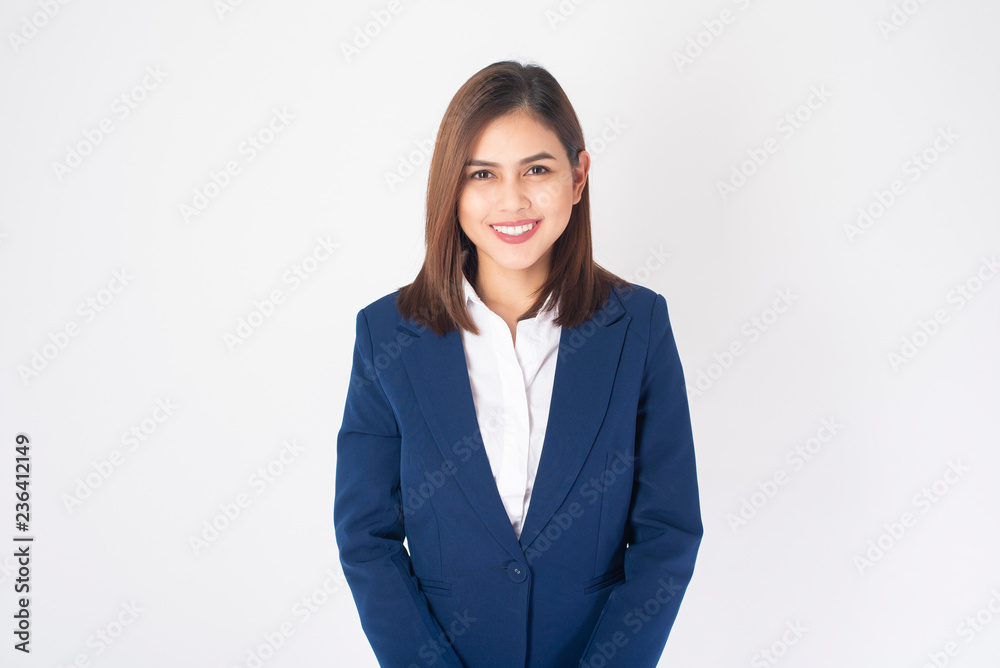 Beautiful Business Woman in blue suit is smiling on white background Beautiful Business Woman in blue suit is smiling on white background